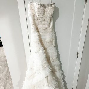 New wedding dress. Never worn. Never altered.